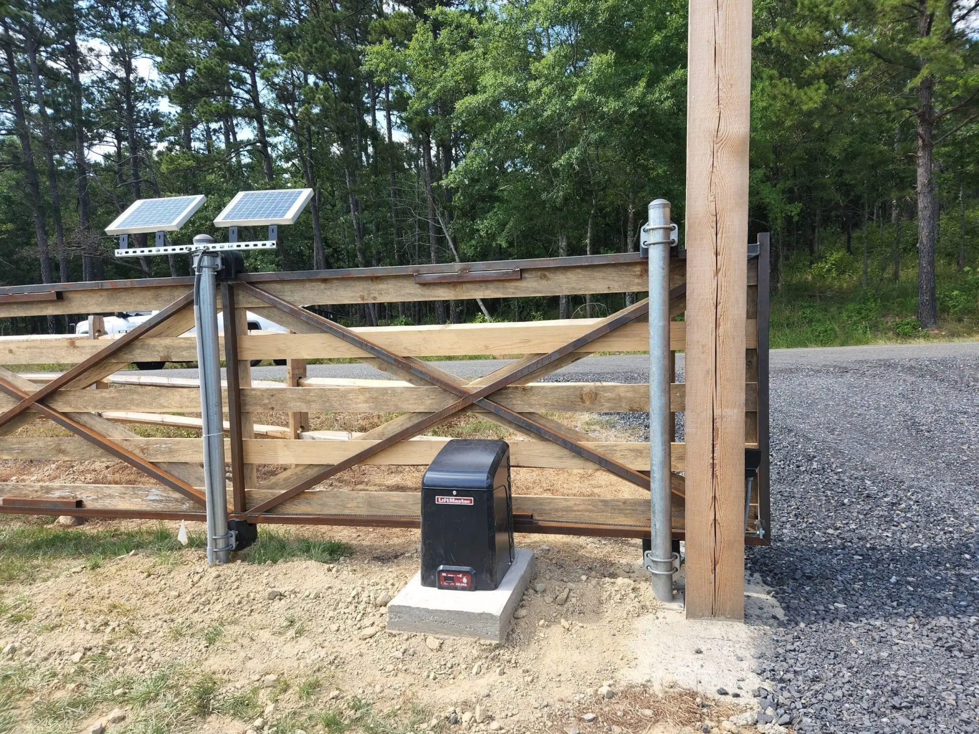 Wooden gate with liftmaster gate access control