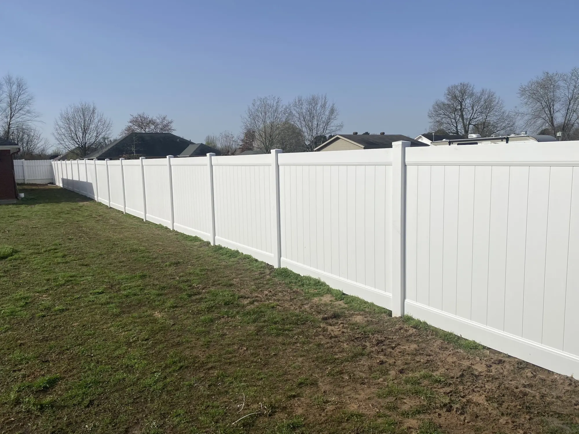 Residential white vinyl fencing